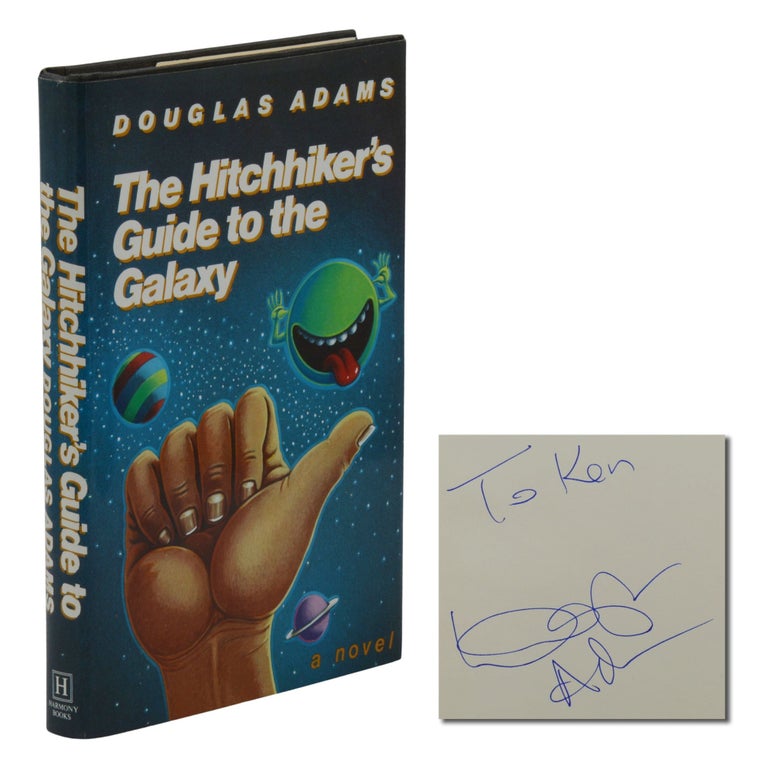 Item #140944415 The Hitchhiker's Guide to the Galaxy. Douglas Adams.