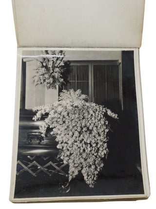 Floral arrangements for caskets, a sample catalog of 18 macabre silver gelatin photographs