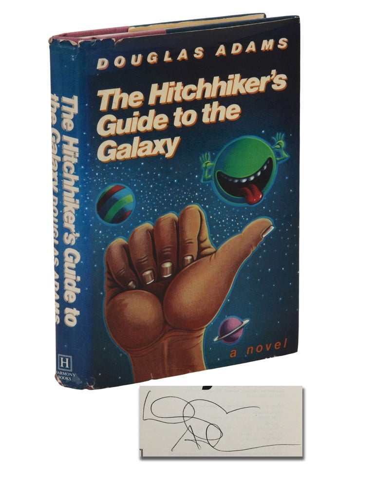 Item #140946320 The Hitchhiker's Guide to the Galaxy. Douglas Adams.