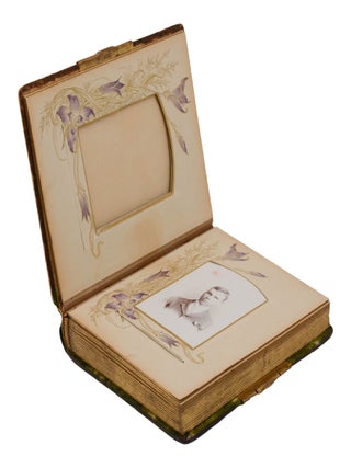Late Victorian/ early Edwardian photo album with thirteen portraits of cross-eyed boys and men