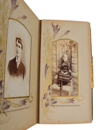 Late Victorian/ early Edwardian photo album with thirteen portraits of cross-eyed boys and men