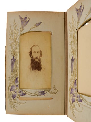 Late Victorian/ early Edwardian photo album with thirteen portraits of cross-eyed boys and men